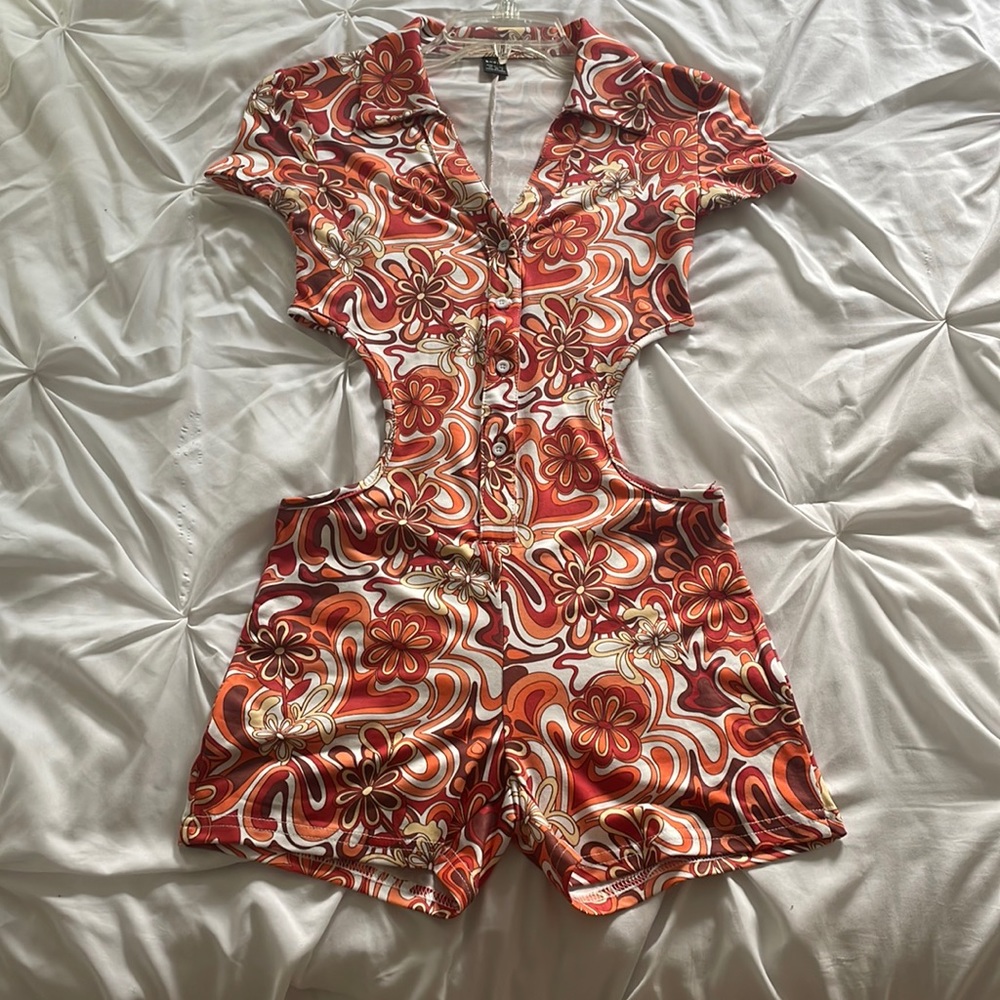 Summer time romper with sides out. Never worn